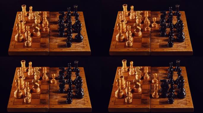在中间游戏中玩旧棋子，停止动作。复古的国际象棋游戏与皇后开局黑色背景