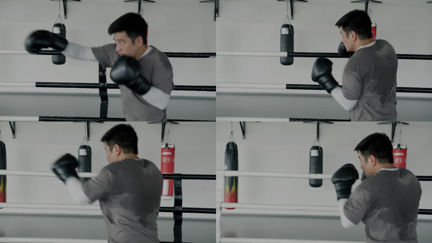 侧视图自信的亚洲拳击手影子搏击训练独自在拳击场集中的动作