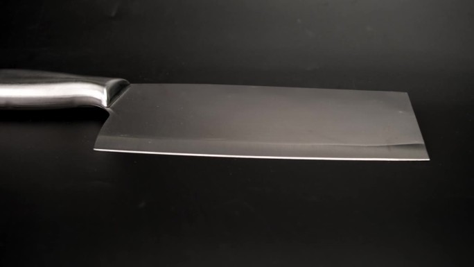 菜刀。大锋利刀，不锈钢手柄，白色背景。