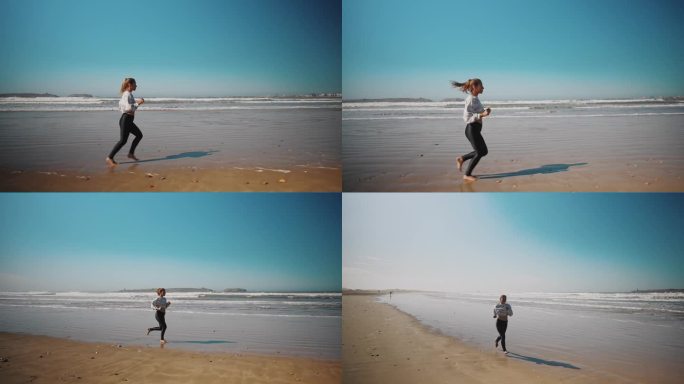 一个女人沿着海岸线在沙滩上慢跑
