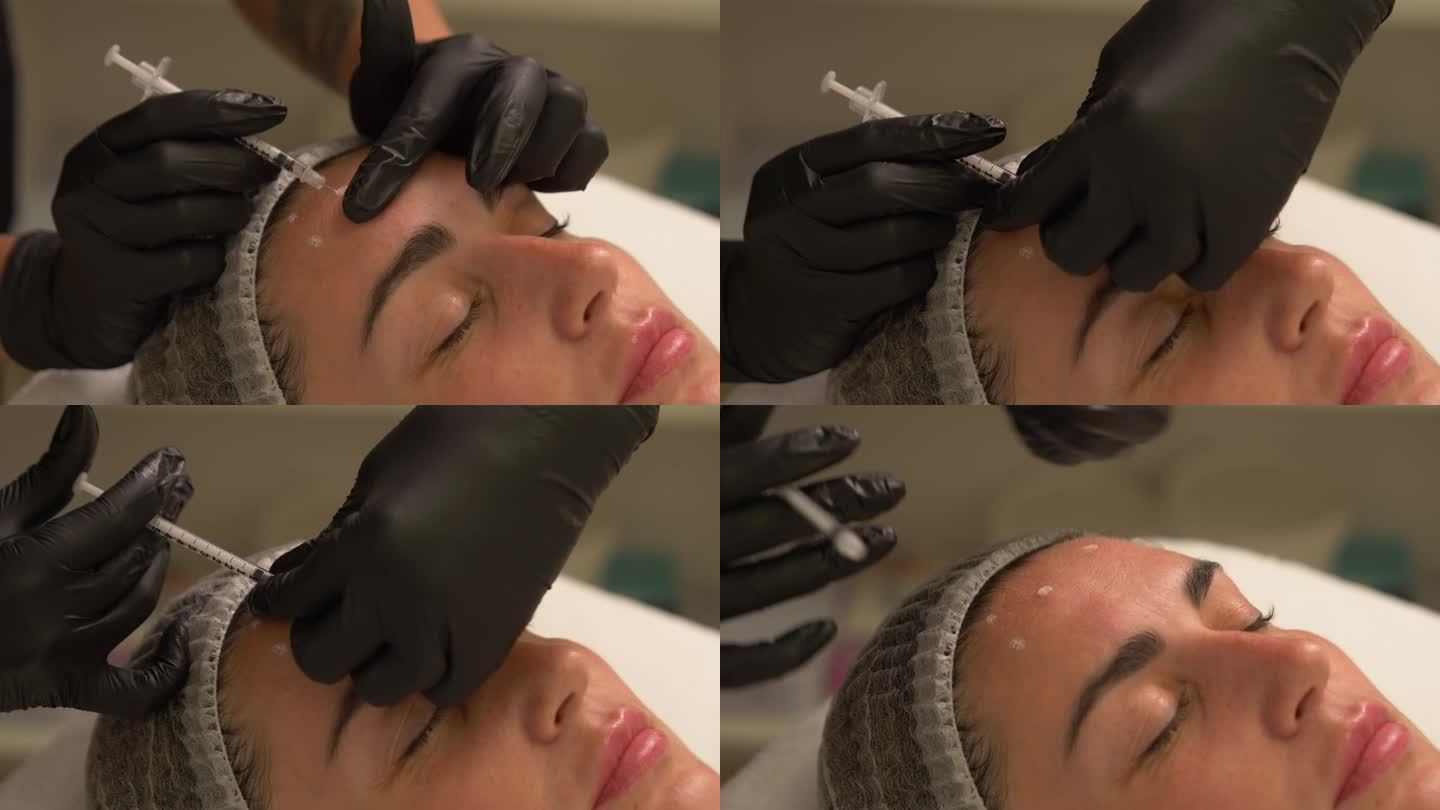 美容诊所。美容师双手戴着手套在女性皮肤上注射衰老剂。一位妇女接受美容美容手术。肉毒杆菌素。注射胶原蛋