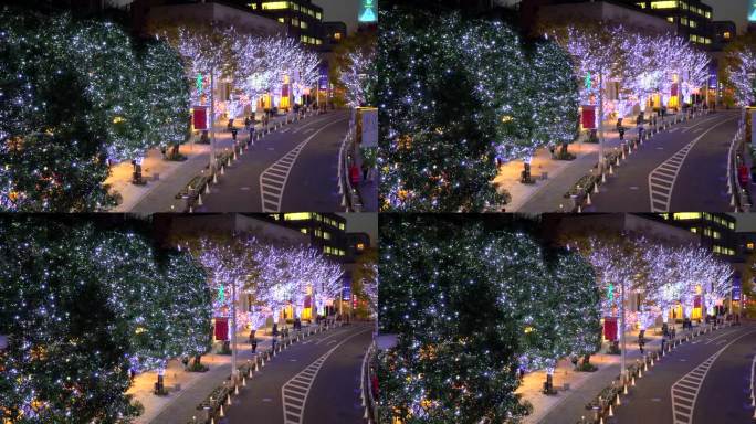 人们在装饰着圣诞彩灯的六本木Keyakizaka散步