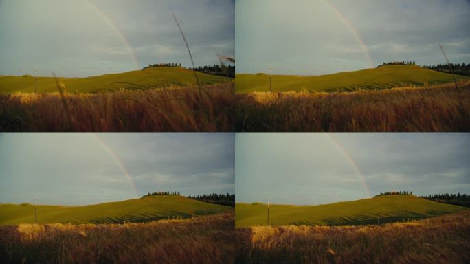 彩虹在托斯卡纳田园诗般的，宁静的乡村景观