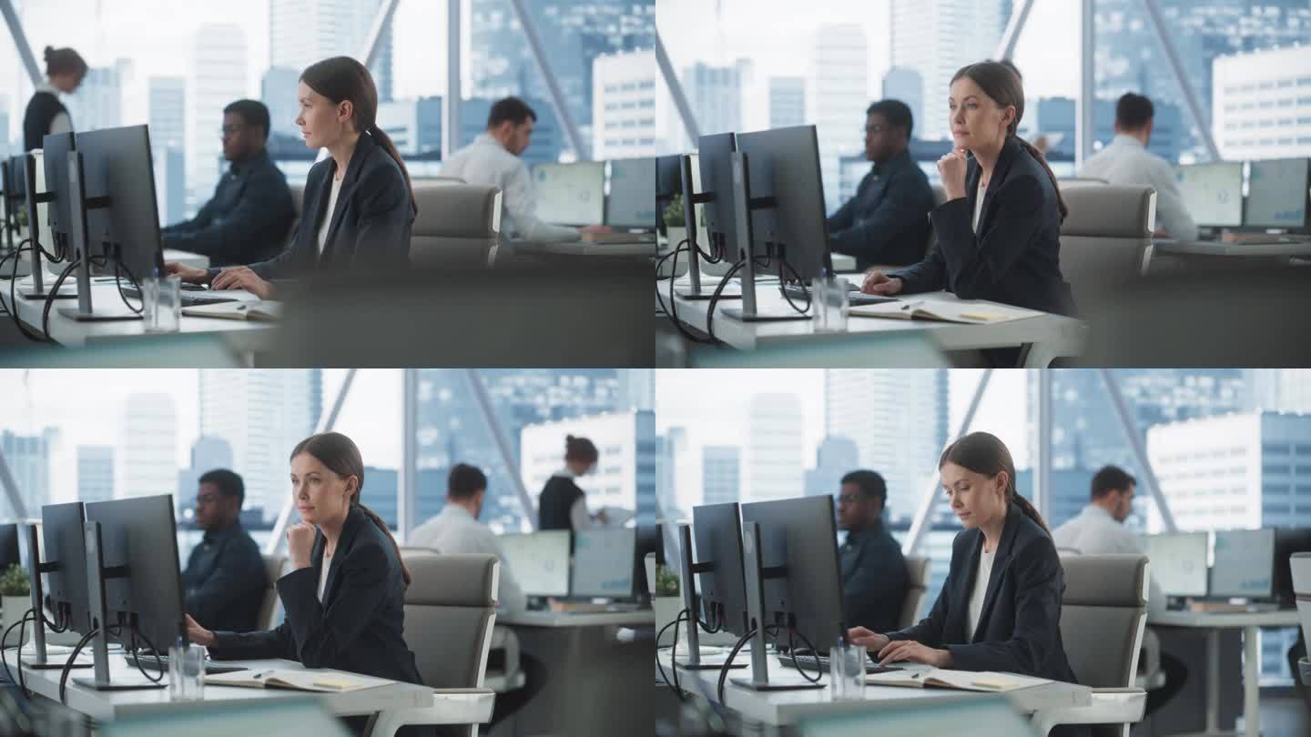 专注的女性运营专家在不同公司办公室的台式电脑上打字，拥有大都市的窗口视图。职业白人女性给客户写邮件，