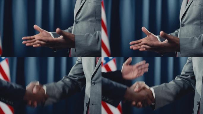 两位深色皮肤的匿名政客在美国国旗前握手