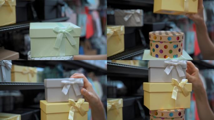 礼物盒子。特写镜头。优雅的彩色礼盒，带蝴蝶结和闪闪发光。假日礼物。包装礼物。购物。超市。