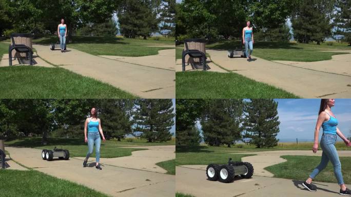 机器人跟着女人无人测试驾驶自动移动跟踪