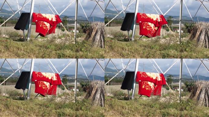 在越南林东，一条毯子被晾在竹竿上，竹竿在风中摇曳