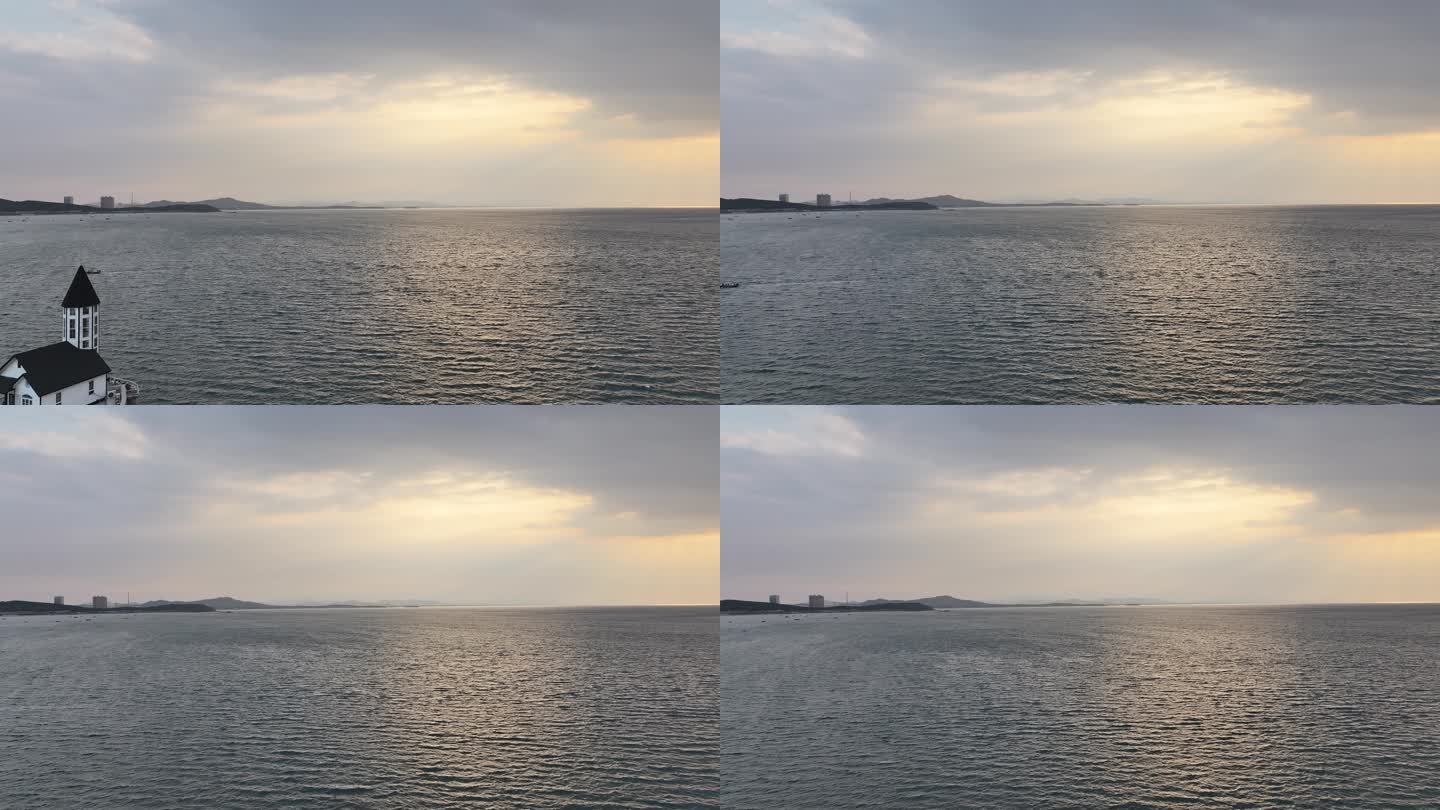 航拍威海西海岸小石岛的海上落日余晖