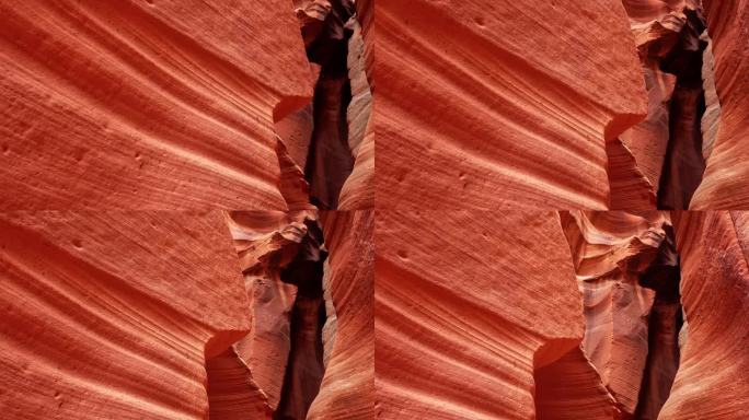 低角度观看高陡峭砂岩岩层在羚羊峡谷在亚利桑那州的风景