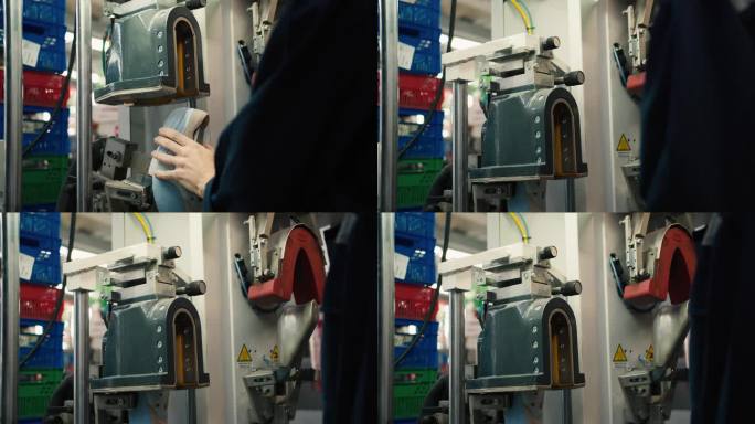 一个穿着蓝色制服的男人把他的鞋子放在一个特殊的机器上压缩鞋子的特写镜头。制鞋阶段