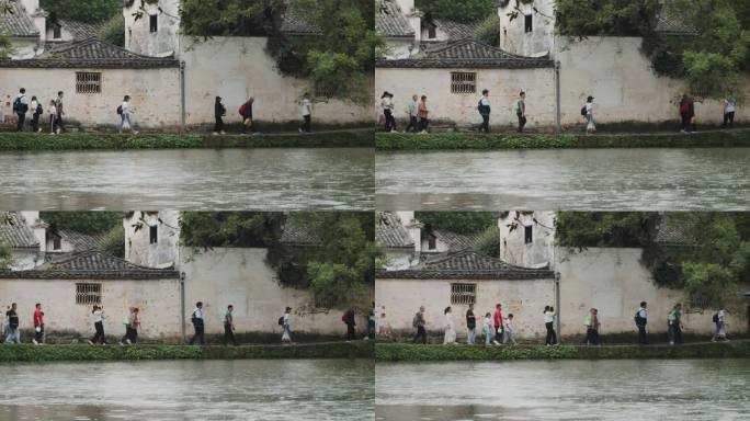 皖南古村雨中游客