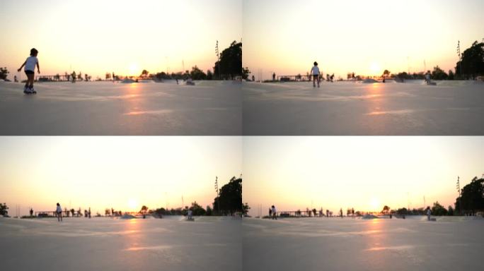 在日落时玩滑板