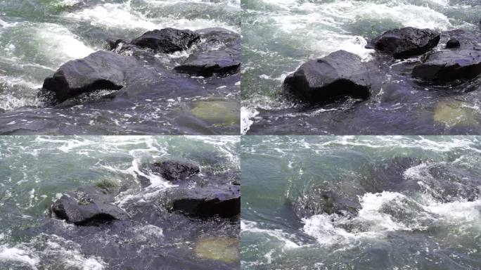 波涛汹涌的海浪拍打着岸边石头