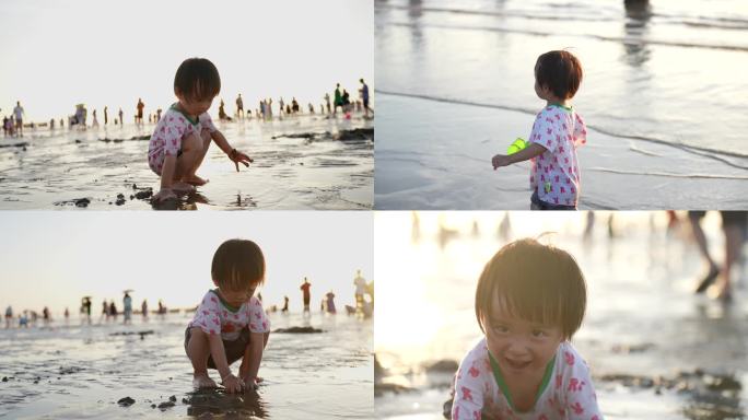 小孩海边沙滩游玩玩泥巴