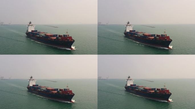 鸟瞰图集装箱货船运载集装箱从码头商业港口进行商业物流