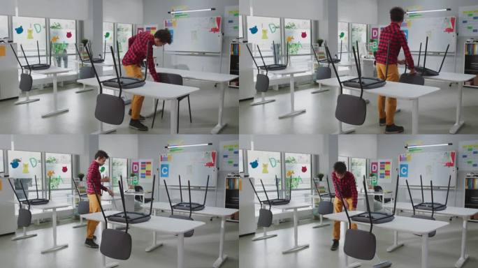 非裔美国少年课后打扫教室，把椅子放在课桌上，扫地