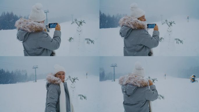 女人们喜欢给雪人拍照