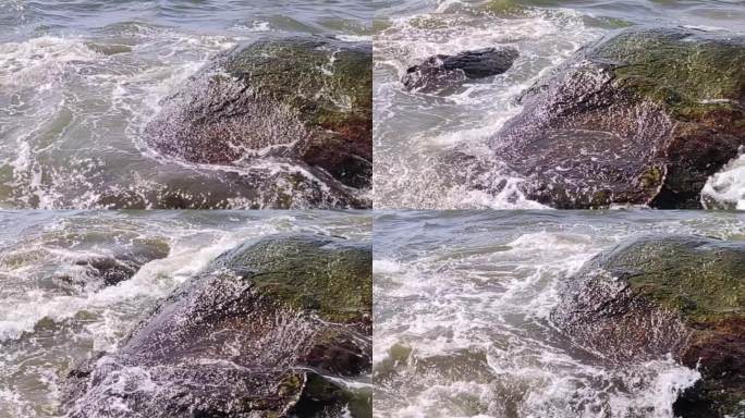 海浪滚滚打礁石海水海浪礁石大海拍打击岩石