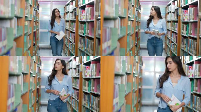 一名女大学生在大学图书馆的书架上找书