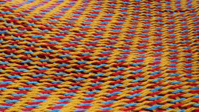 红、黄、蓝针织面料布料为抽象表面背景