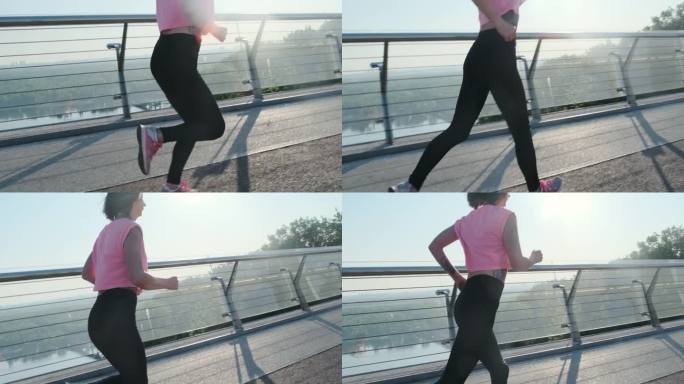 穿着皮制打底裤的女性腿在桥上疾跑