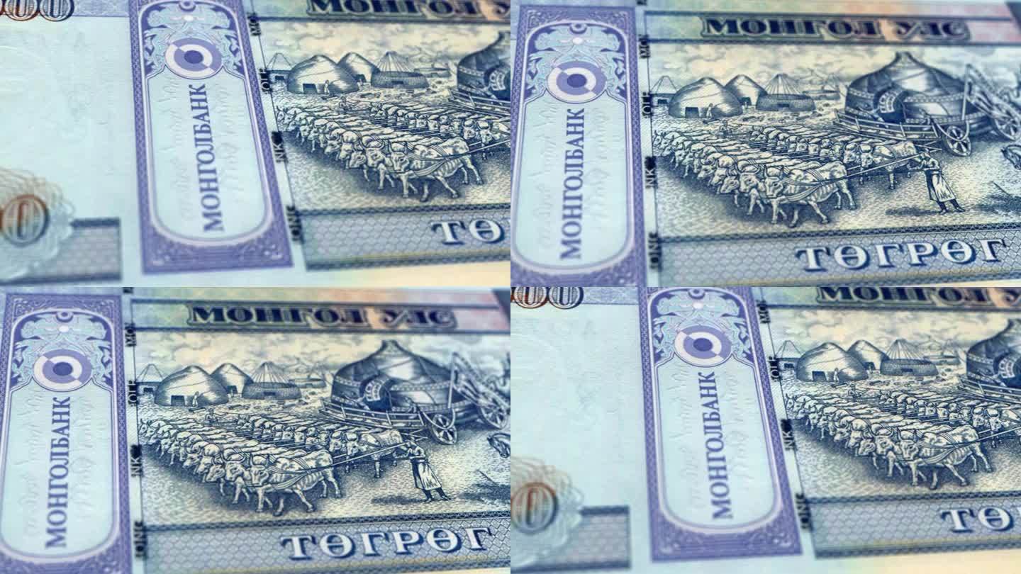 蒙古蒙古图格里克1000张纸币，蒙古图格里克1000张纸币，蒙古图格里克的特写和宏观视角，跟踪和多利
