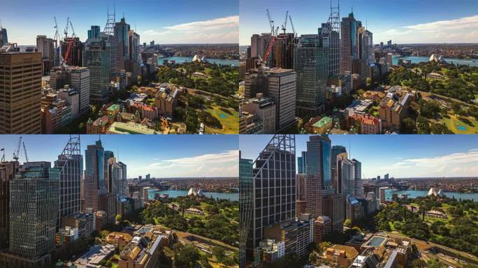通过海港大桥、环形码头和悉尼海港的现代建筑群，俯瞰悉尼中央商务区上空的4K鸟瞰图