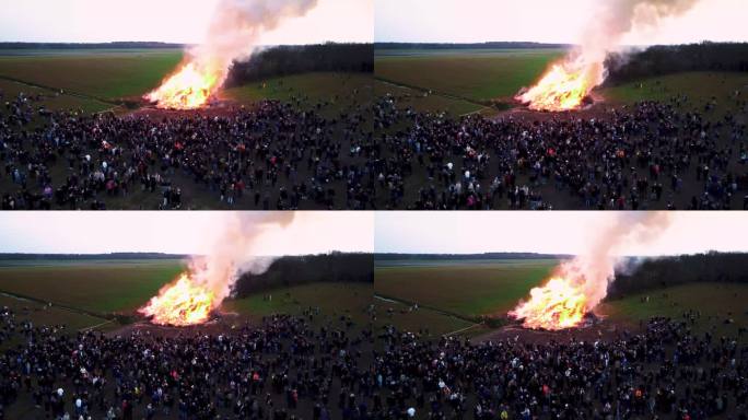 当地人聚集在一个大篝火旁。