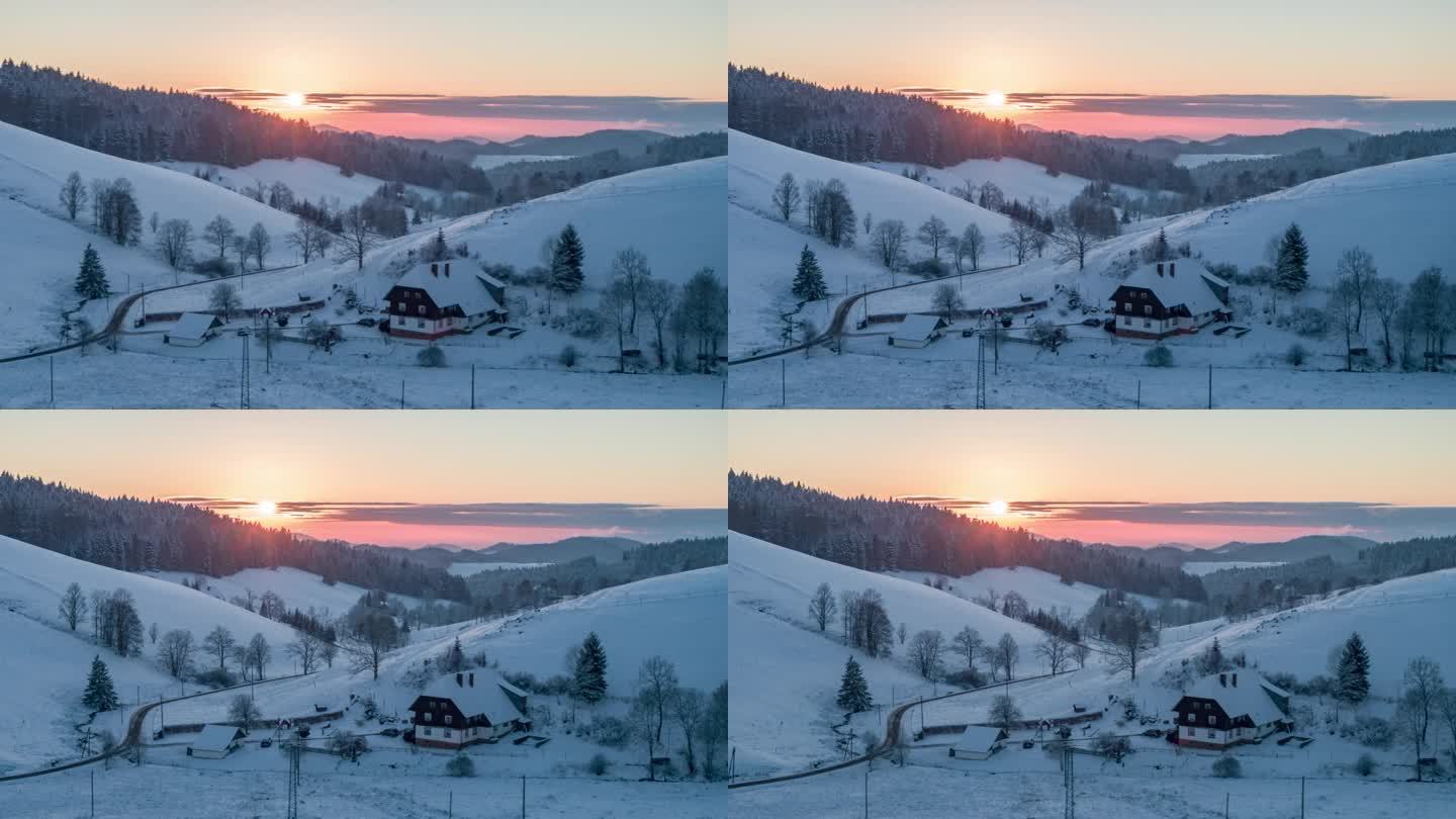 冬天，太阳落在雪山上