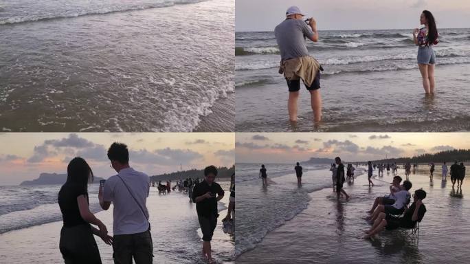 夕阳 美景 海边 北海紫霞湾游客海边拍照