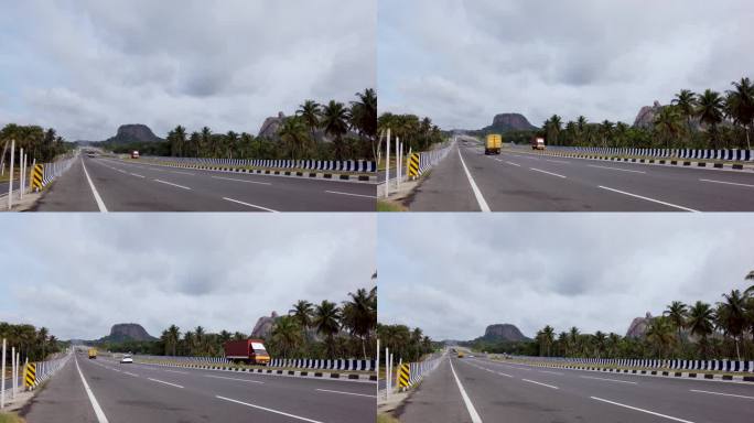 正午时分，印度卡纳塔克邦首府班加罗尔附近的拉马纳加拉，岩石山脉上风景如画的高速公路。