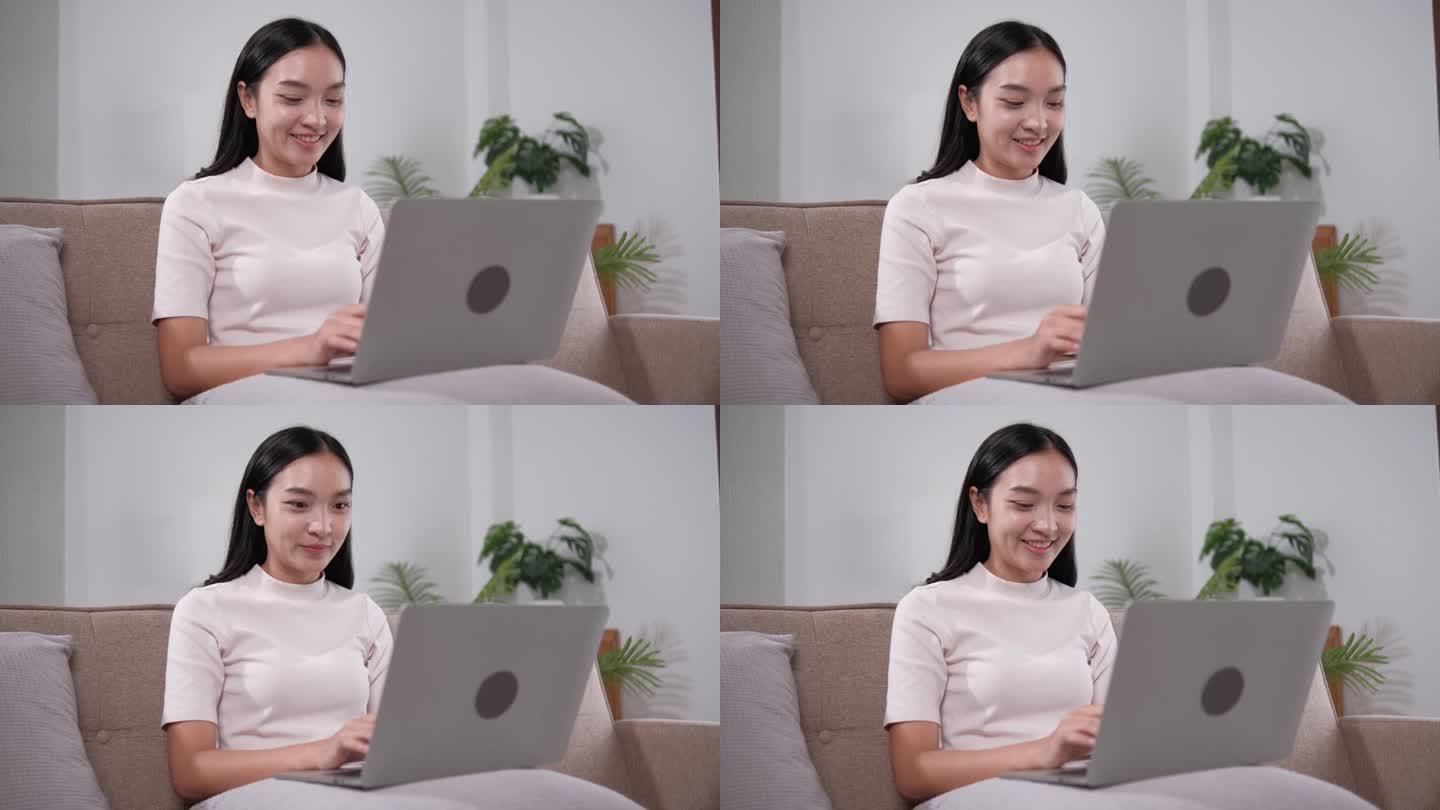 亚洲女性员工使用笔记本电脑远程办公，在家办公，看着电脑交谈，进行混合虚拟会议，学习英语，通过视频通话