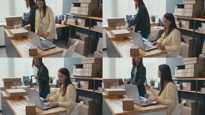 女员工在笔记本电脑和包装盒上回复客户信息