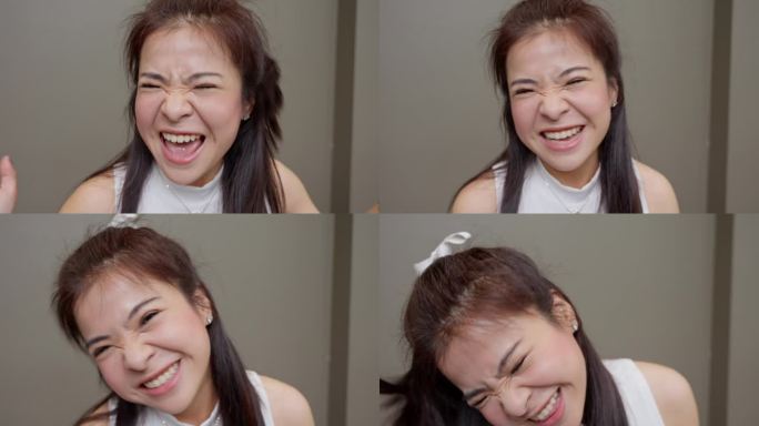 在一个温暖人心的特写镜头中，一位年轻的亚洲女子的脸上洋溢着纯粹的幸福。