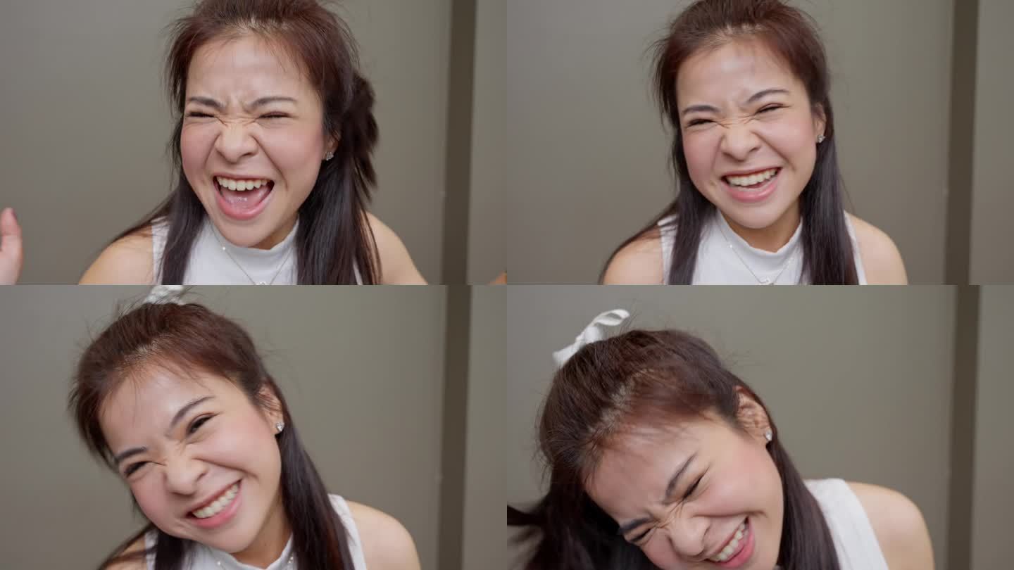 在一个温暖人心的特写镜头中，一位年轻的亚洲女子的脸上洋溢着纯粹的幸福。