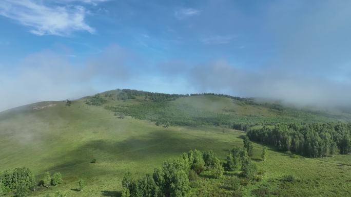 航拍绿色山野晨雾缭绕