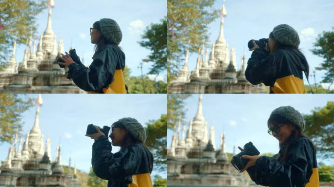 一位兴高采烈的妇女在旅途中拍摄这座迷人的寺庙。
