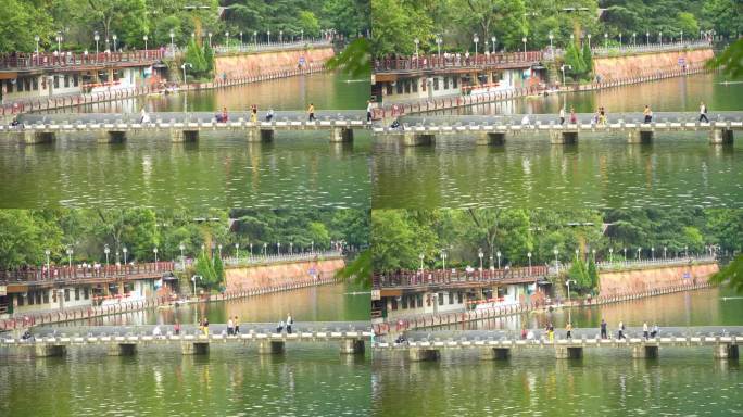 贵州遵义湘江河上的桥和行人