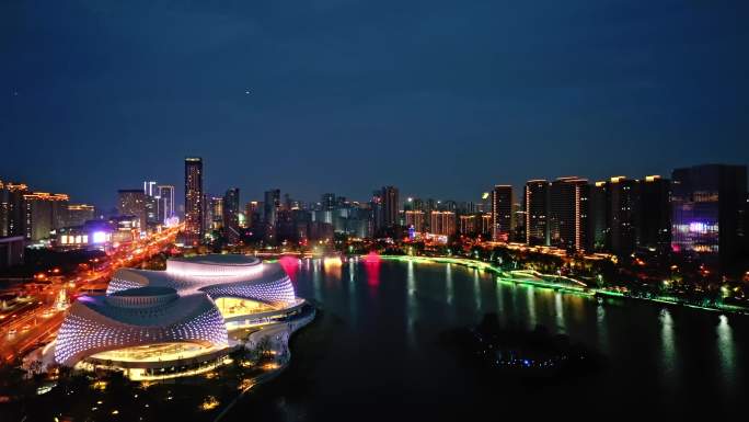 4K航拍杭州钱塘区下沙金沙湖夜景音乐喷泉