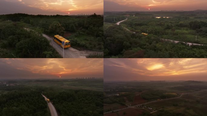 夕阳晚霞下行驶在乡间小路上的黄色校车巴士