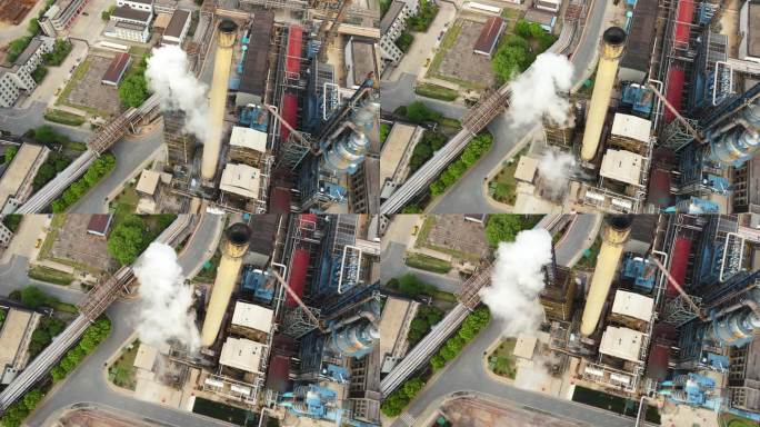 航拍城市石化工业工厂环保烟囱和机器设备