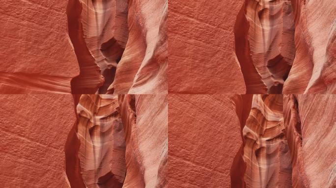 在亚利桑那州纳瓦霍领地的羚羊峡谷，低角度观看高大陡峭的红色砂岩岩层的景色