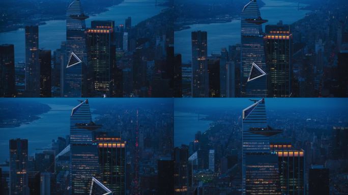美国纽约市哈德逊广场摩天大楼30号附近的夜景鸟瞰。夜间航拍镜头与现代摩天大楼拥挤的观景阳台。游客观赏