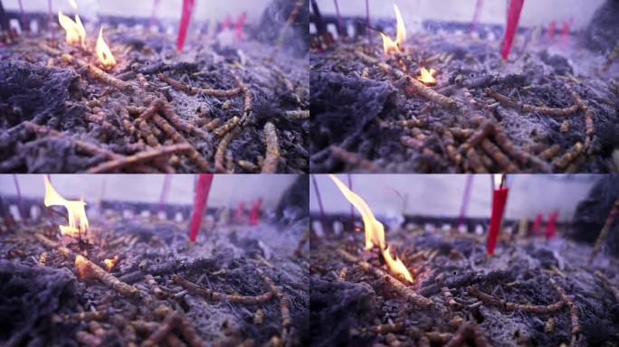宗教寺庙燃烧火焰祈祷祝福的香炉蜡烛