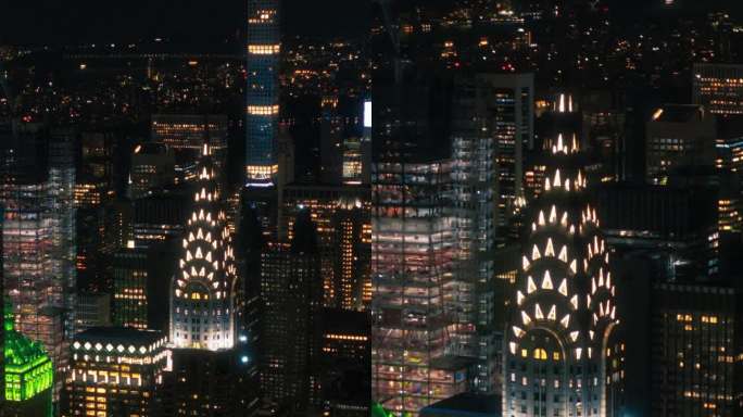 垂直屏幕:曼哈顿下城鸟瞰图。从直升机上拍摄的金融商业区全景夜景。纽约历史悠久的办公大楼和摩天大楼的风