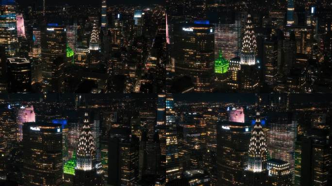 曼哈顿下城建筑鸟瞰图。从直升机上拍摄的金融商业区全景夜景。纽约历史悠久的办公大楼和摩天大楼的风景