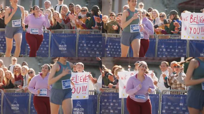 大码微笑女跑者展示意志力参加城市马拉松慢镜头。友好的参赛者向观众挥手，决心到达终点线