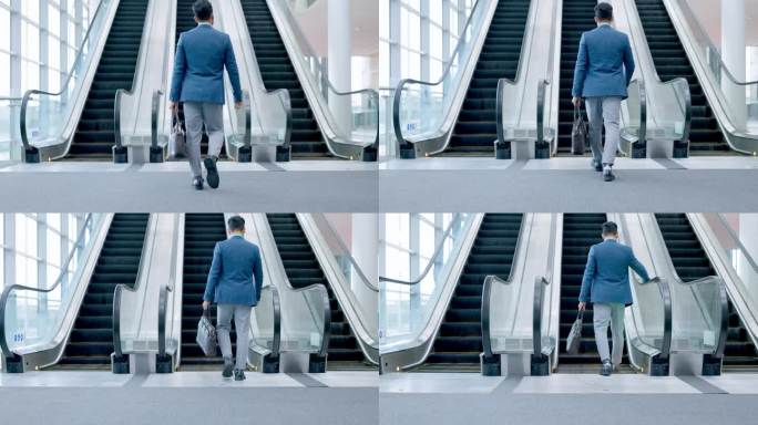 办公大厅或办公大楼入口的步行、商务、自动扶梯。在机场候机楼里移动，楼梯上和拿着包或公文包的人