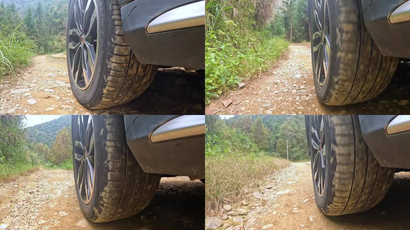 车轮胎快速行驶在泥土路石子路